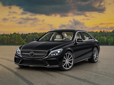Black sedan in golden hour setting