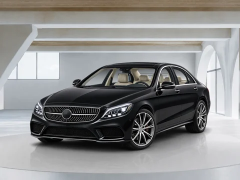 Black sedan in daylight gallery setting