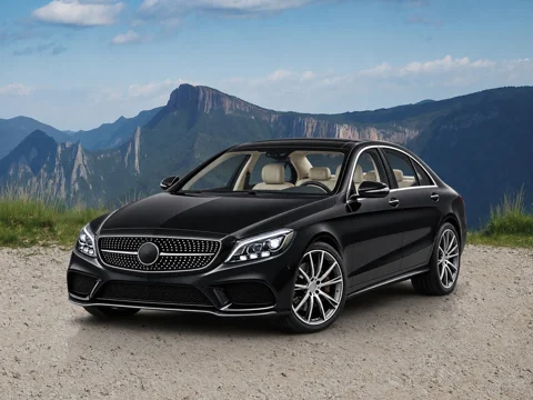 Black sedan in alpine overlook setting